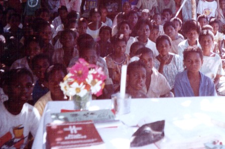 Young children and families gather for the Holy Sacrifice of the Mass in the jungle, the bush territory of Papua New Guinea.